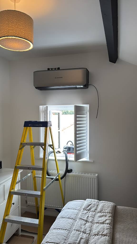 ICE KOOL engineer assessing a property for air conditioning