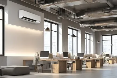 Open-plan office with a wall-mounted air conditioner