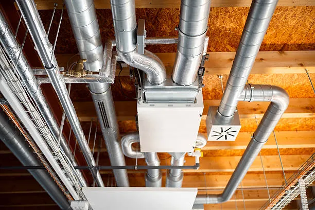 ICE KOOL engineer planning a bespoke HVAC installation on site